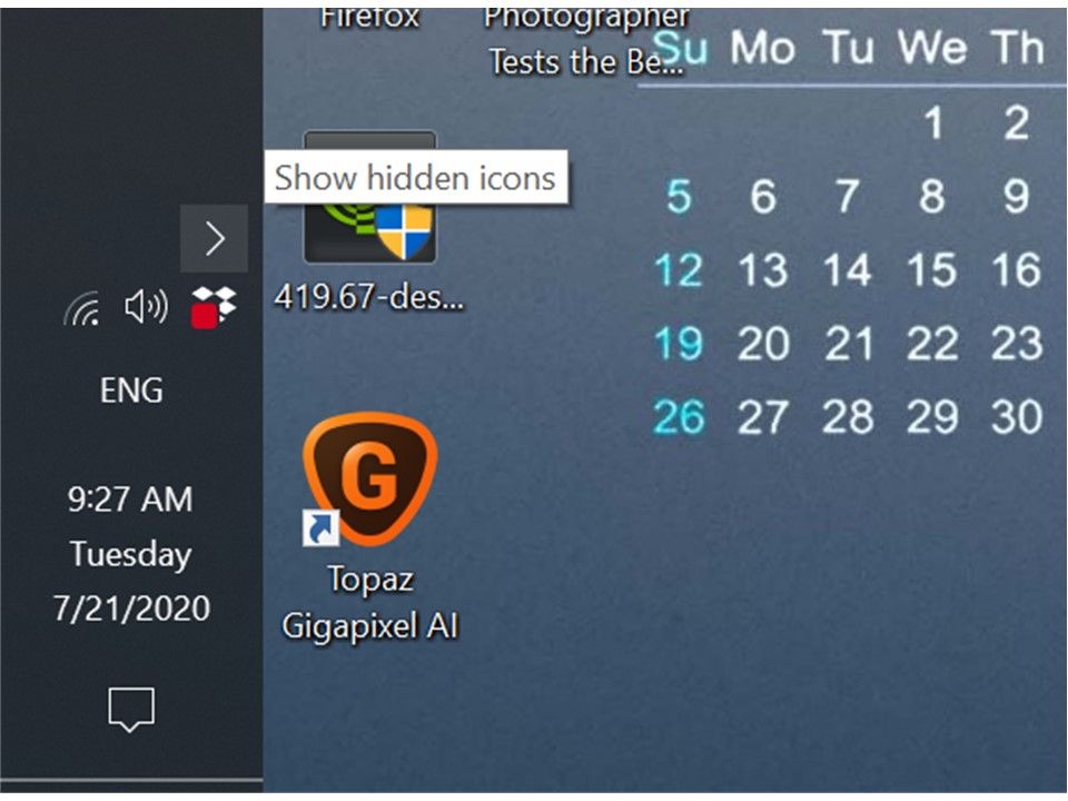There's a red indicator on the Dropbox icon in the system tray, what is ...